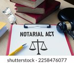 Small photo of Notarial act of Notary public is shown using the text