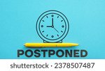 Small photo of Postponed concept for business meeting, website advertising and others is shown using a text and picture of clock