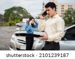 Small photo of Two drivers call insurance after a car accident before taking pictures and sending insurance. Online car accident insurance claim idea after submitting photos and evidence to an insurance company.