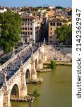 Small photo of Rome, Italy - May 27, 2018: Panorama of Rome historic center over Ponte Sant'Angelo, Saint Angel Bridge, known as Aelian Bridge or Pons Aelius at Tiber river