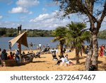 Small photo of Ruislip UK. 28 August 2023. The busy beach and playground at Ruislip Lido, London Borough of Hillingdon, UK. Photographed at the end of August bank holiday.