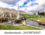 Small photo of St. Petersburg, Russia - August 23, 2023: Fountains of Peterhof. Golden statues of Grand Cascade and Samson Fountain at Peterhof Palace.