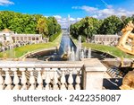 Small photo of St. Petersburg, Russia - August 23, 2023: Fountains of Peterhof. View of Grand Cascade, Sea Canal from Grand Palace. Golden statues, Samson Fountain in Lower park of Petrodvorets