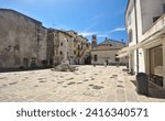 Small photo of Grado, Friuli Venezia Giulia,Italy-15 May 2023:Campo Dei Patriarchi, a square in the historic part of the city.