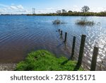 Small photo of Storm Babet brings extreme flooding from the River Aire to agricultural fields alongside the Birkin, West Haddlesey Road, Selby, North Yorkshire in October 2023. Horizontal. Space for copy.