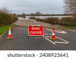 Small photo of Storm Henk, the River Ouse bursts its banks and floods the agricultural fields around the villages of Kelfield and Cawood, near Selby, North Yorkshire in January, 2024. Horizontal. Space for copy.
