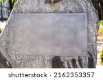 part of a granite  monument with an empty tablet