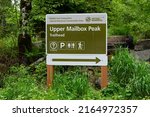 Small photo of North Bend, WA, USA - June 06, 2022; Signage with direction for the popular Seattle area hiking trail at Upper Mailbox Peak Trailhead along the Middle Foerk of the Snoqualmie River near North Bend WA