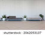 Leather daybeds, waiting area with plants and copyright space