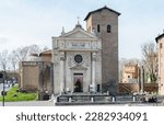 Small photo of Church of San Nicola in Carcere. Rome. Italy. 03.21.2023. The Church of St. Nicholas in the dungeon. The Marcellus Theater. The wall of the church with the columns of the ancient temple of Janus