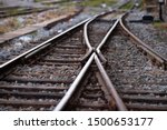 Railroad tracks with a junction on the front