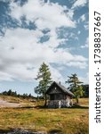 Small photo of Abandoned wooden house in mountains, hiking trail. Sunny day on Vogel mountain in Slovenia.