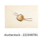 old mail envelope with gold wax seal stamps isolated on white