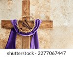 Small photo of Lent season, Holy week and Good friday concept. Cross With three Nails And Crown Of Thorn on stone background