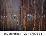 Small photo of ottoman mansion door handle. wooden door and door handle of historical turkish house. Safranbolu houses door handle