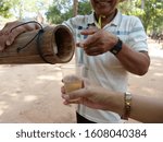 Small photo of Asian palmyra palm ,sugar palm toddy palm juice in Angkor Wat complex, Siem Reap Cambodia.