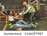 Small photo of Friendship and sympathy for workers injured during work concept : Male african american worker injured in arm wearing cast sits in pain gets sympathy for help to take sick leave to heal.