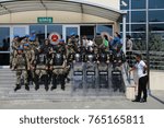 Small photo of "Cumhuriyet Case" is going on. Lots of soldier keep guard in front of the door with their guns . Istanbul, Turkey. September 11, 2017.