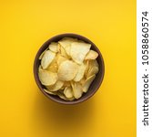 Crispy Potato Chips In Bowl On...