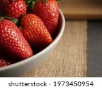 Small photo of Strawberries on a trill close up