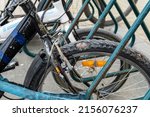 A bicycle tire is damaged. An old bicycle. Selective focus. Old worn out bicycle tire.