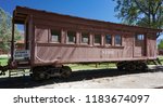 Small photo of An old wooden railroad carriage, built in 1883 as a combination passenger and baggage car, later converted to a caboose, now in Laws, California.