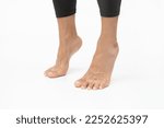 Small photo of Stand tall on tip-toes. Foot exercises for flexibility and mobility