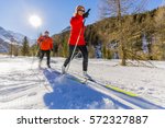 A family group of cross country skiers on a sunny winter morning in Italy Alps, South Tirol, Solda.