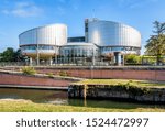 Small photo of Strasbourg, France - September 13, 2019: The building of the European Court of Human Rights (ECHR) was designed by Italian-British architect Richard Rogers and built in 1995 by the Marne-Rhine canal.