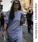Small photo of MILAN, Italy- September 19 2018:Veronique Tristram on the street during the Milan Fashion Week.