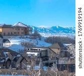 Small photo of Square Beautiful houses surrounded by unobstructed Wasatch Mountains and sky views
