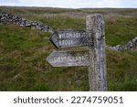 Footpath sign for Goyt's Lane and Wildmoor Stone brook in the Peak District National Park, UK