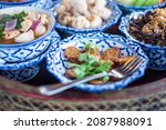 Small photo of traditional Thai food on bamboo tray or Khan Toke, local food in Northern of Thailand