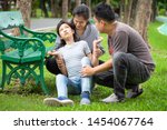 Small photo of Sick little child girl with epileptic seizures in outdoor park,daughter suffering from seizures,illness with epilepsy during seizure,asian mother,father care of girl patient,brain,family care concept