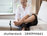 Small photo of Old elderly with foot injuries,ankle bone diseases,heel pain or soles,asian senior woman suffering from peripheral neuropathy,beriberi,nerve inflammation of the foot, numbness of the feet and toe