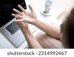 Small photo of Female office worker suffering from trigger finger disease,painful in fingers and wrist,hurt the hand,health problems,Concept of Trigger Finger,Digital Flexor Tenosynovitis or Stenosing Tenosynovitis