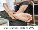 Small photo of Elderly woman massage her foot,Plantar fasciitis,pain in soles of foot and heel bone,Tarsal tunnel syndrome,compression of a nerve in foot or Achilles tendonitis,inflammation of tendon at back of heel