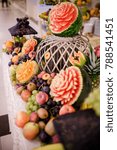 Small photo of fruit bar with fresh and healthy fruits on a table