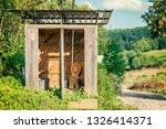 Wooden shed ecological composting toilet on countryside eco farm - Concept image