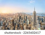 Amazing panorama view of New York city skyline and skyscraper at sunset. Beautiful cityscape in Midtown Manhattan. Copy space for text.