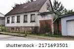 Small photo of Old and ugly dilapidated city house in Denmark