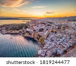 Small photo of Aerial view of stunning sunset over Ibiza (Evissa) during a winter evening with view of the medieval fortress and the old town