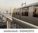 Small photo of Bangkok, Thailand. January 6, 2024 :The MRT Yellow Line "YM22" a monorail system and the train is a straddle without a driver, using rubber wheels to run on concrete beams, Save a lot of travel time.