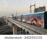 Small photo of Bangkok, Thailand. January 6, 2024 :The MRT Yellow Line "YM22" a monorail system and the train is a straddle without a driver, using rubber wheels to run on concrete beams, Save a lot of travel time.