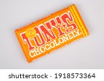 Small photo of Bordeaux , Aquitaine France - 02 13 2021 : Tonys Chocolonely milk chocolate bar with brand text logo and text sign tony's