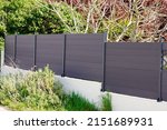 high grey fence modern barrier aluminum slats suburb house protection view home