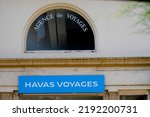 Small photo of Bordeaux , Aquitaine France - 08 15 2022 : havas voyages logo sign of travel agency agents text brand in wall office facade