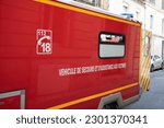 Small photo of Bordeaux , Aquitaine France - 02 27 2023 : fireman rescue truck ambulance red panel van firefighter rescue victims car truck in street