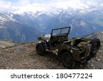 Military Jeep At The Summit Of...
