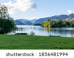 Beautiful view of Derwentwaterin the quaint market town of Keswick in the Lake District, England UK. The lake is three miles long and is fed by the River Derwent. No people. Pure natural beauty.